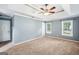 Spacious main bedroom with tray ceiling and lots of natural light at 3506 Billingsley Dr, Marietta, GA 30062