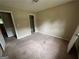 Neutral-toned bedroom with plenty of space at 718 Hardy Way, Hiram, GA 30141