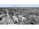Aerial view of modern townhomes with a cityscape backdrop at 1836 Memorial Dr # 303, Atlanta, GA 30317