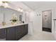 Modern bathroom features a double sink vanity and a glass-enclosed shower at 1836 Memorial Dr # 303, Atlanta, GA 30317