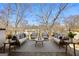 Spacious outdoor living area featuring seating, stylish decor, and views of the backyard at 1836 Memorial Dr # 303, Atlanta, GA 30317