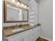 Bathroom featuring a vanity with granite countertop and a framed mirror at 79 The Farm Rd, Mcdonough, GA 30252