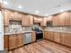 Updated kitchen with stainless steel appliances, granite countertops, and lots of cabinet space at 79 The Farm Rd, Mcdonough, GA 30252