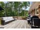 Extensive deck area featuring comfortable seating, a grill, and ample space for outdoor entertaining at 2163 Medfield Ne Trl, Chamblee, GA 30345