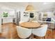Open-concept living room and kitchen with hardwood floors and abundant natural light at 2163 Medfield Ne Trl, Chamblee, GA 30345