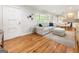 Bright living room with hardwood floors, a neutral sofa, and ample natural light for a comfortable atmosphere at 2163 Medfield Ne Trl, Chamblee, GA 30345