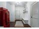Welcoming entryway with a vintage soda machine, a built-in bench, and ample storage at 785 Wilson Nw Rd, Atlanta, GA 30318