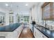Bright eat-in kitchen boasts a large island, stainless steel appliances, and sleek countertops at 785 Wilson Nw Rd, Atlanta, GA 30318
