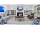 Cozy living room with fireplace, built-in shelving, and comfortable seating arrangement at 785 Wilson Nw Rd, Atlanta, GA 30318