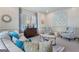 Bright living room with stylish decor, plantation shutters, and comfortable seating arrangement at 785 Wilson Nw Rd, Atlanta, GA 30318