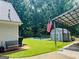 Backyard features pool, shed, carport, and mature trees at 149 Crown Oaks Dr, Stockbridge, GA 30281