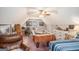 Bedroom featuring a pool table, leather chair, and home office space at 149 Crown Oaks Dr, Stockbridge, GA 30281