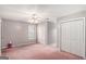 Bedroom with neutral walls, closet, ceiling fan, and natural light at 149 Crown Oaks Dr, Stockbridge, GA 30281