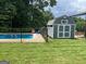 In-ground pool is fenced-in and features storage shed at 149 Crown Oaks Dr, Stockbridge, GA 30281