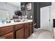 Bathroom vanity with stylish decorations, wooden cabinets, and white marble tile at 2780 Lakeview Walk, Decatur, GA 30035