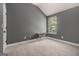 Comfortable carpeted bedroom with plenty of natural light and light gray walls at 2780 Lakeview Walk, Decatur, GA 30035