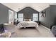 Primary bedroom with neutral colors, carpeted floors, high ceilings, and natural light at 2780 Lakeview Walk, Decatur, GA 30035