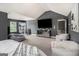 Expansive primary bedroom with neutral walls, carpet, plenty of natural light, and seating area at 2780 Lakeview Walk, Decatur, GA 30035