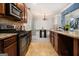 Charming kitchen features granite counters, a gas range stove and stainless steel appliances at 2780 Lakeview Walk, Decatur, GA 30035