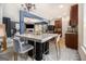 Modern kitchen with an island featuring seating, seamlessly connected to the living room at 2780 Lakeview Walk, Decatur, GA 30035