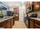 Spacious kitchen boasts granite counters, stainless steel appliances, and convenient layout at 2780 Lakeview Walk, Decatur, GA 30035