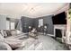 Cozy living room featuring plush seating, a fireplace, and stylish decor at 2780 Lakeview Walk, Decatur, GA 30035