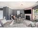 Cozy living room featuring plush seating, a fireplace, and stylish decor at 2780 Lakeview Walk, Decatur, GA 30035