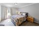 Cozy bedroom features soft light, neutral walls, plush carpet, and ensuite access at 30 Court, Ellenwood, GA 30294