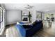 Spacious living room features hardwood floors and a painted fireplace at 30 Court, Ellenwood, GA 30294