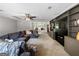 Large living room with custom shelving, soft lighting and lots of space for entertaining and relaxing at 30 Court, Ellenwood, GA 30294