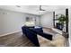 Open floor plan living room with a fireplace and hardwood floors at 30 Court, Ellenwood, GA 30294