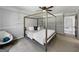 The spacious main bedroom features neutral walls, a ceiling fan, and ensuite access at 30 Court, Ellenwood, GA 30294