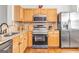 Well-equipped kitchen featuring stainless steel appliances and granite countertops at 420 Heritage Park Nw Trce # 22, Kennesaw, GA 30144