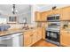Kitchen with stainless steel appliances and granite countertops at 420 Heritage Park Nw Trce # 22, Kennesaw, GA 30144