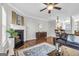 Cozy living room with a fireplace, hardwood floors, and neutral decor at 420 Heritage Park Nw Trce # 22, Kennesaw, GA 30144