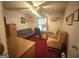 Bedroom featuring a desk, futon and natural light from the window at 7133 Babbling Brook Dr, Jonesboro, GA 30236