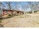 Expansive backyard featuring a lush lawn and privacy fence, offering ample space for outdoor activities at 2522 Frost Sw Dr, Marietta, GA 30008