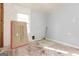 Bedroom featuring a bright window, cement board, and exposed flooring ready for remodel and your design ideas at 2522 Frost Sw Dr, Marietta, GA 30008