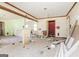 Spacious living room undergoing renovation, showcasing exposed beams and abundant natural light at 2522 Frost Sw Dr, Marietta, GA 30008