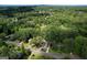 An aerial view of a suburban neighborhood with mature trees and well-maintained homes at 2676 Cottonwood Dr, Marietta, GA 30066