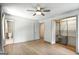 Open bedroom featuring hardwood floors, closet space, and bathroom entry at 2676 Cottonwood Dr, Marietta, GA 30066