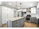 Modern kitchen featuring an island, stainless steel appliances, and shaker cabinets at 2676 Cottonwood Dr, Marietta, GA 30066