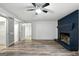 Open-concept living room featuring a brick fireplace and ample space at 2676 Cottonwood Dr, Marietta, GA 30066