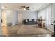 Bright living room with wood-look floors, a large window, and stylish contemporary decor at 4706 Cedar Park Trl, Stone Mountain, GA 30083