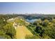 Panoramic aerial view shows mature landscaping, park features, lake, and the Atlanta skyline at 1271 Mackintosh Nw Park # 30, Atlanta, GA 30318