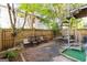Backyard area with a fence, seating, and a spiral staircase at 1271 Mackintosh Nw Park # 30, Atlanta, GA 30318