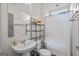 Clean, well-lit bathroom with a pedestal sink and shower with a white curtain at 1271 Mackintosh Nw Park # 30, Atlanta, GA 30318