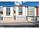 Modern townhomes featuring colorful accents and large windows for natural light at 1271 Mackintosh Nw Park # 30, Atlanta, GA 30318