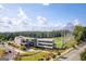 An attractive golf and entertainment facility featuring a driving range and a modern, multi-story building at 1271 Mackintosh Nw Park # 30, Atlanta, GA 30318