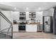 Modern kitchen with white cabinets, stainless steel appliances, and stylish finishes at 1271 Mackintosh Nw Park # 30, Atlanta, GA 30318